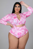 Plus size model wearing a pink and white long sleeve and high waisted bikini set